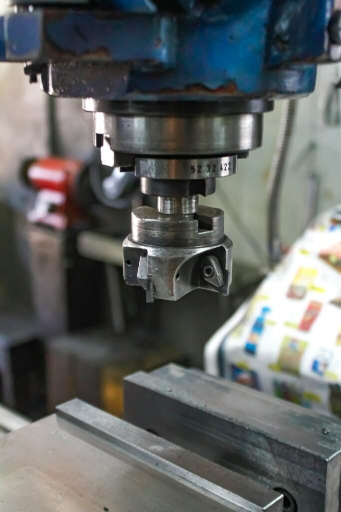 a-machine-that-is-working-on-a-piece-of-metal-6fjepz-sgg